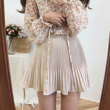 White pleated skirt